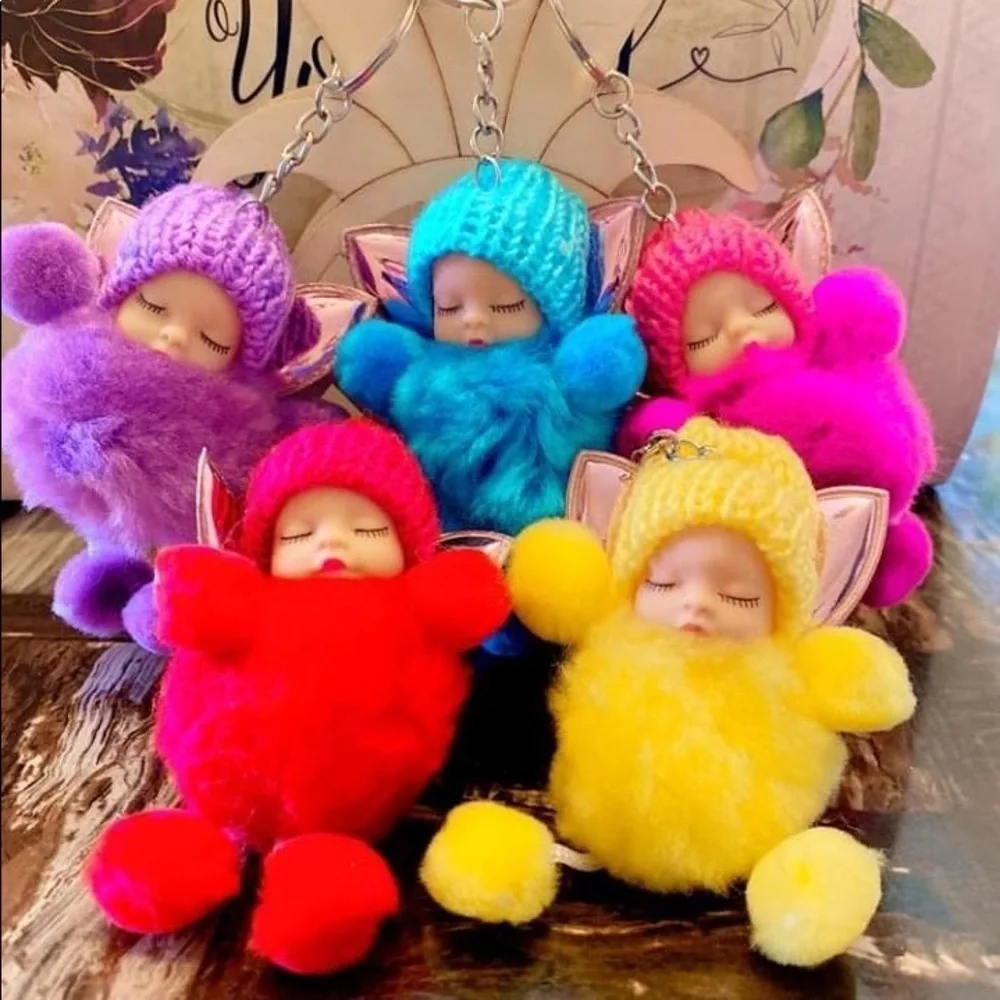 Sleepy baby with fairy wings‎ small pompon in purple keychain charm key holder
